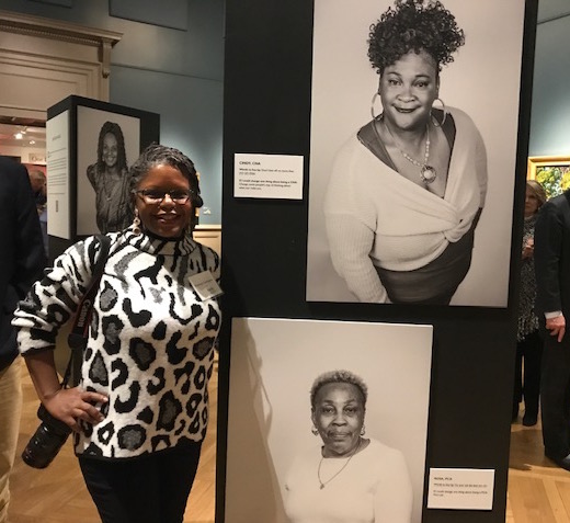 Photographer Penelope Carrington (Petite Shards Productions) and some of the exhibit panels